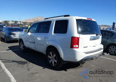 2012 Honda Pilot Touring z USA, uszkodzony, nr VIN 5FNYF4H90CB075668